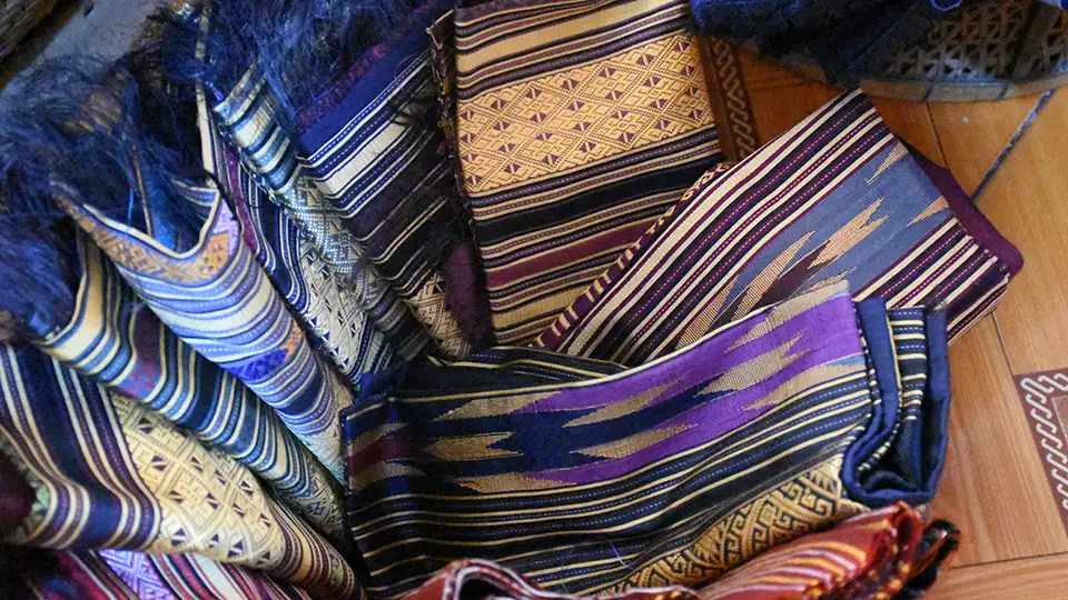 A collection of “Luang Prabang Silk” scarves